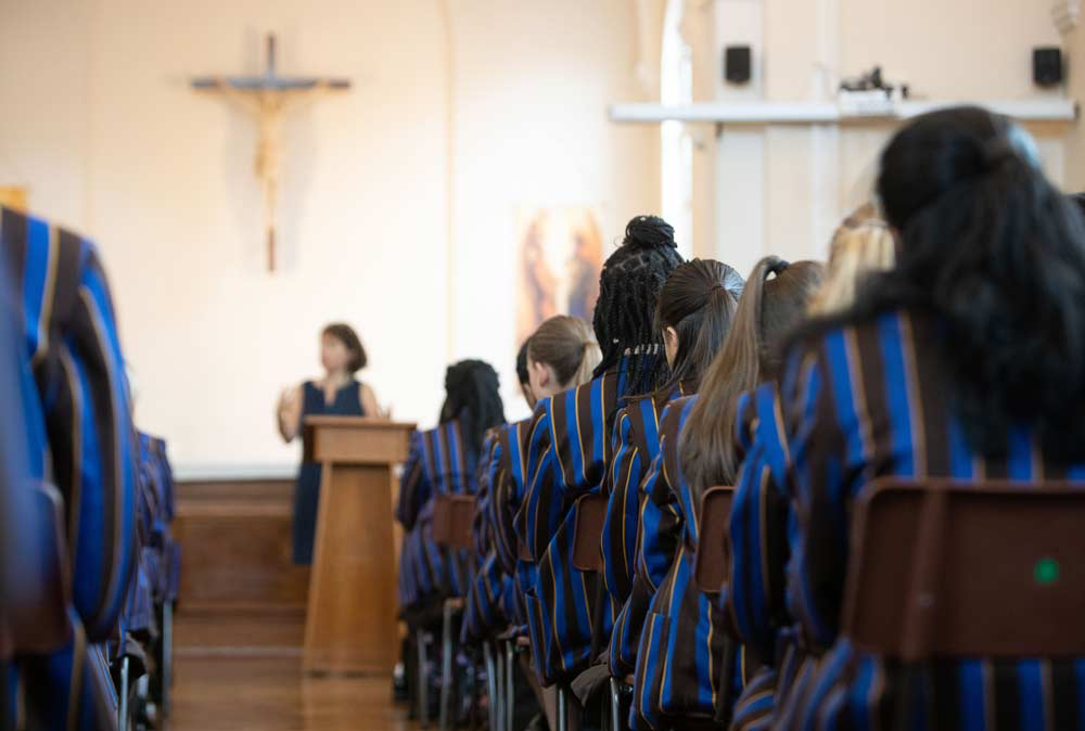 Students sat in the Chapel 